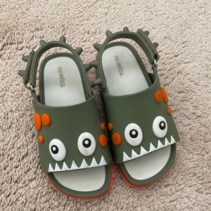 mini Melissa beach slide Dino